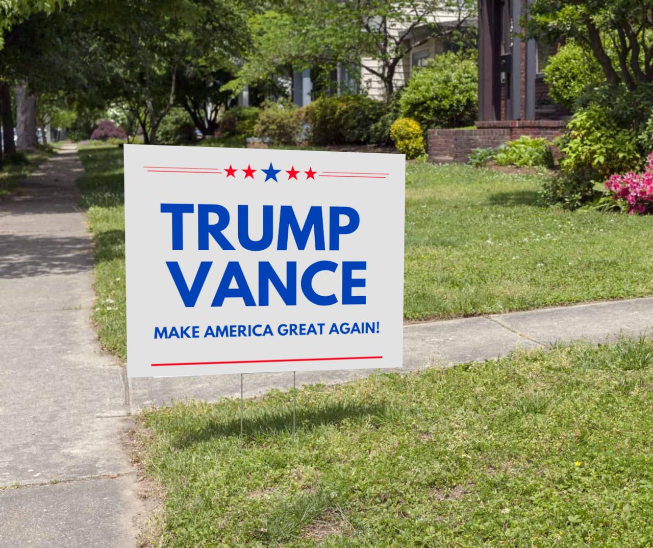 Trump Vance campaign sign on suburban lawn grass