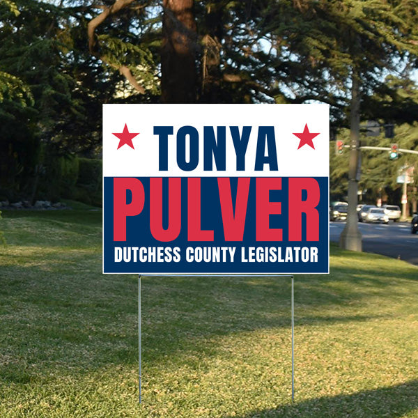 Campaign sign for Tonya Pulver running for Dutchess County Legislator displayed on a grassy lawn.
