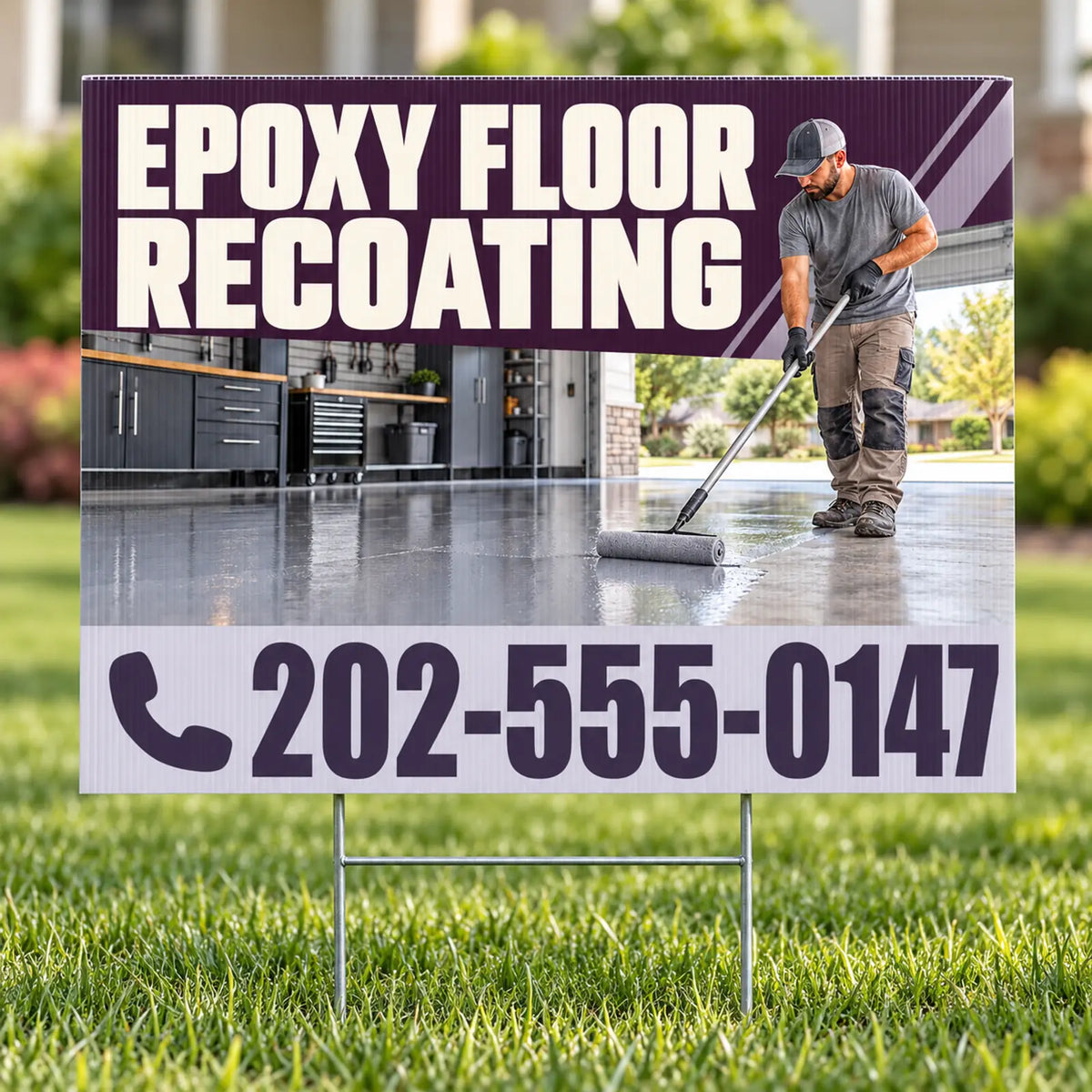 A yard sign on a metal stake displayed on a green lawn, featuring a promotional graphic for epoxy floor recoating with a worker mopping a glossy floor and the phone number 202-555-0147.