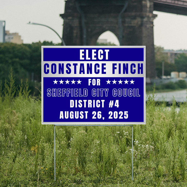 Campaign sign for Constance Finch running for Sheffield City Council, District 4, election date August 26, 2025, placed in a grassy area with a bridge in the background.