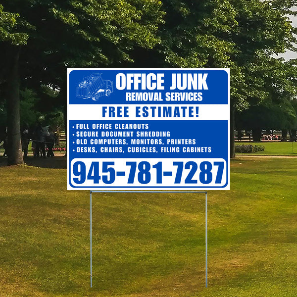 Office junk removal services sign with phone number for free estimate, offering office cleanouts, secure document shredding, and removal of old electronics and office furniture, displayed in a park setting.