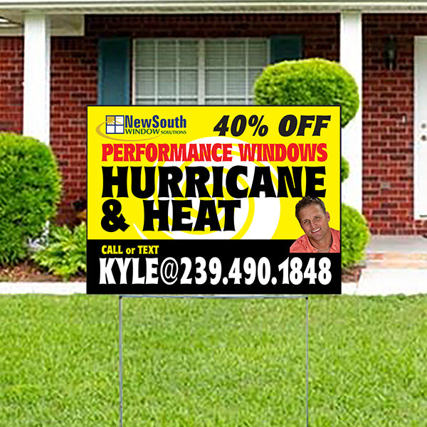 Yard sign for NewSouth Window Solutions offering 40% off performance windows for hurricane and heat protection with contact information for Kyle at 239-490-1848 in front of a house.
