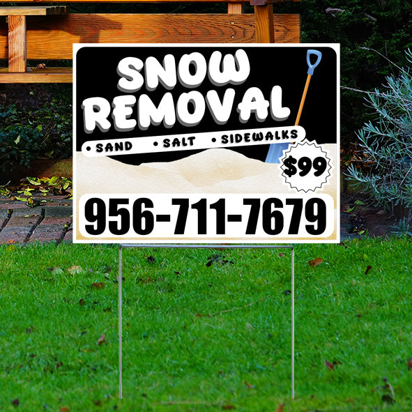 Snow removal advertisement sign on a lawn offering sand, salt, sidewalks services for $99 with a contact number 956-711-7679.