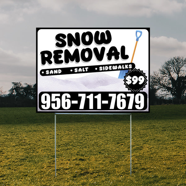 Lawn sign advertising snow removal services with sand, salt, and sidewalks listed, priced at $99, featuring a phone number 956-711-7679 and a graphic of a snow shovel.