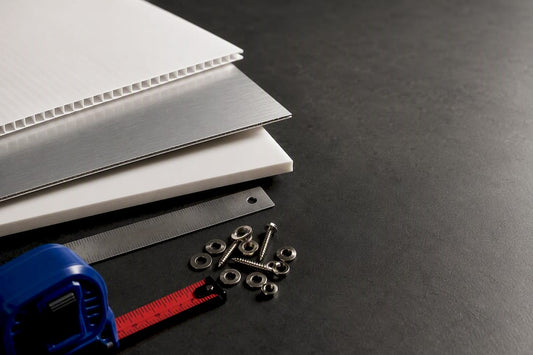 Close view of sign materials and measuring tools
