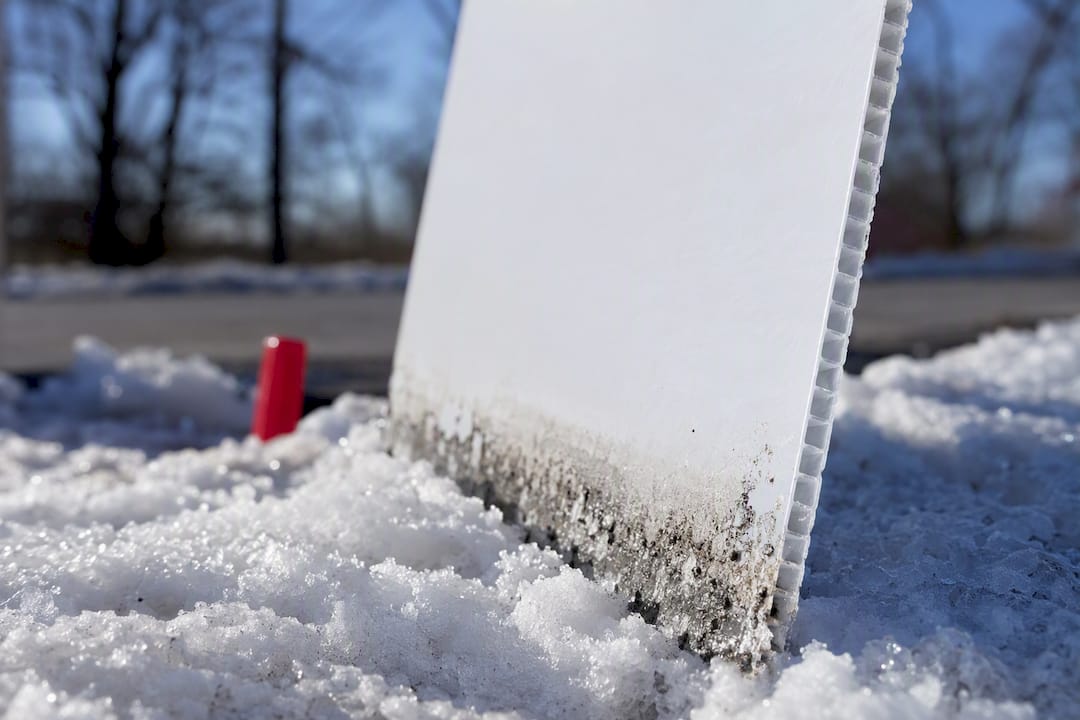 Anonymous sign panel edge in winter snow