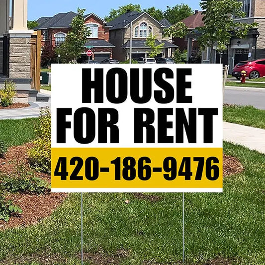 House for rent sign on suburban neighborhood lawn.