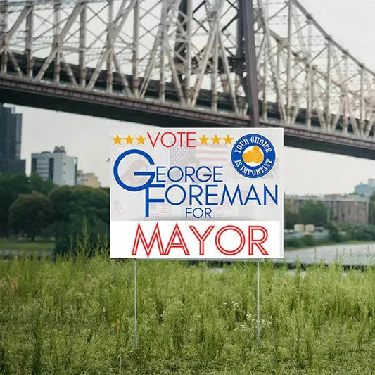 high-contrast sign with bridge in the background