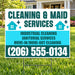A yard sign for 'Cleaning & Maid Services' displayed on a green lawn in front of a house. The sign features a white top section with dark teal text, a bright cyan middle section with dark teal text, and a dark teal bottom section with a large white phone number.