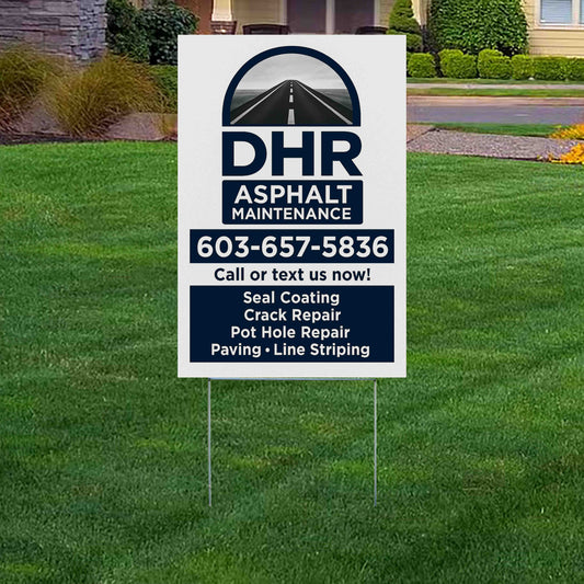 Lawn sign for DHR Asphalt Maintenance on green grass, featuring services like seal coating, crack repair, pot hole repair, paving, and line striping with contact information 603-657-5836.