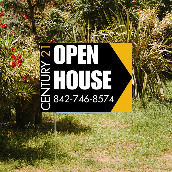 Real estate open house sign for Century 21 with contact phone number displayed in a garden setting.