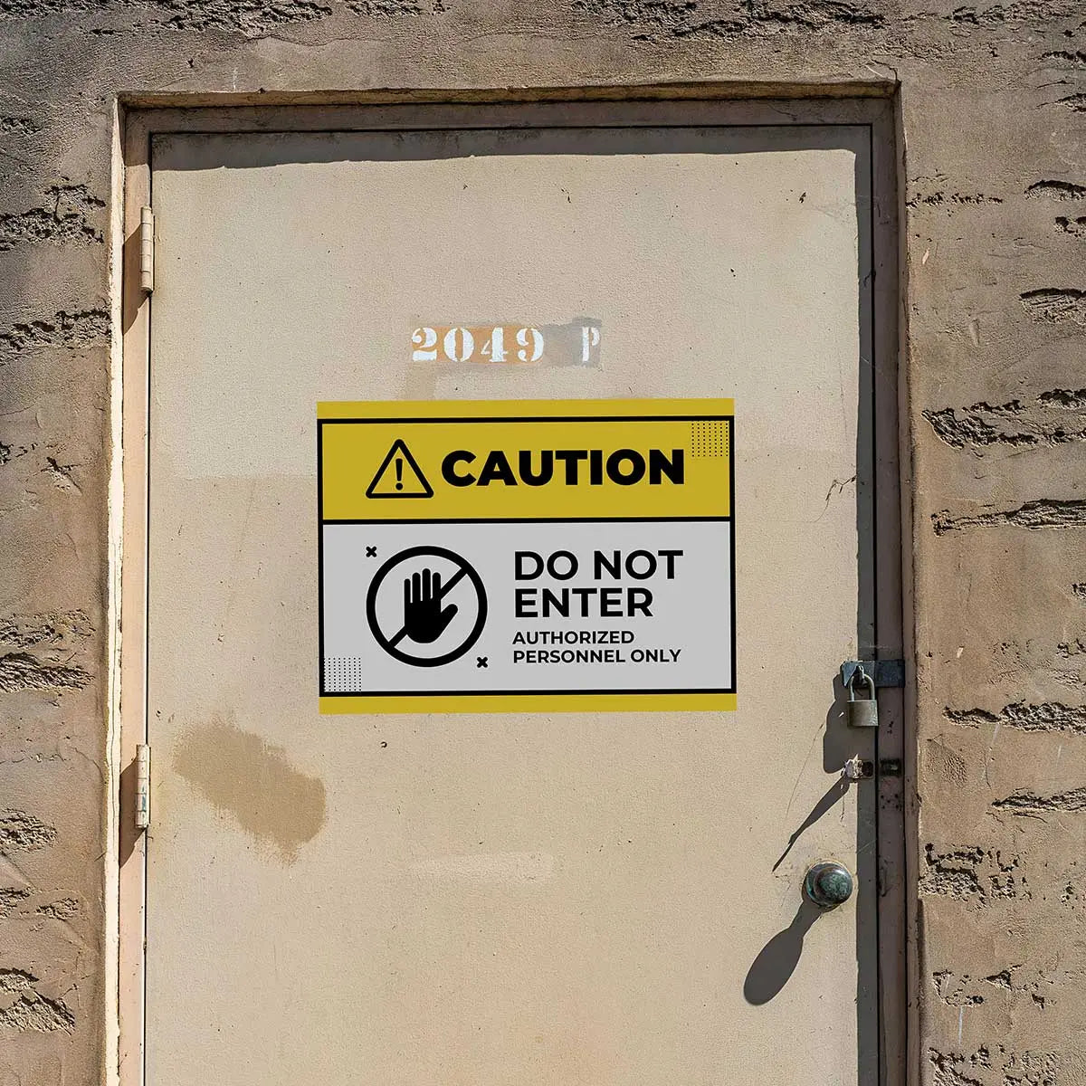 Caution sign on a door with 'Do Not Enter' and 'Authorized Personnel Only' text.