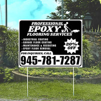 Advertisement sign for epoxy flooring services with contact information on a grassy area.