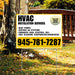 Outdoor sign for HVAC installation services listing heat pumps, central AC systems, furnaces, and coil cleaning with contact number 945-781-7287, set in a garden with trees and a bench.