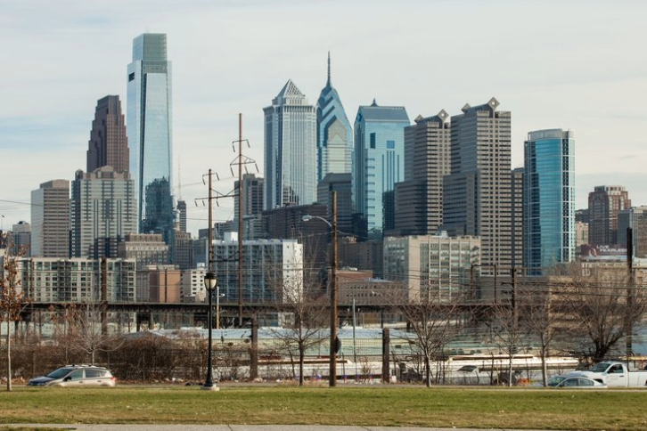 City skyline with tall buildings and a clear sky