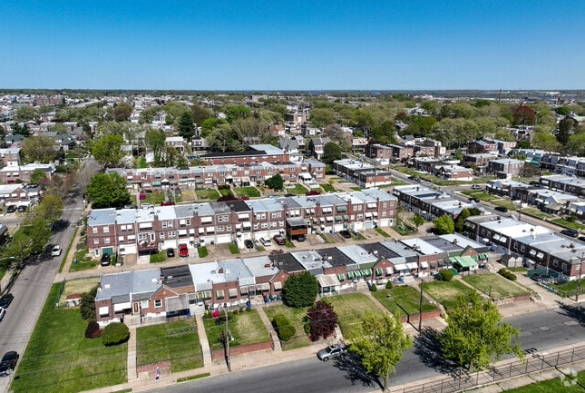 Aerial view of a residential neighborhood with houses and streets.