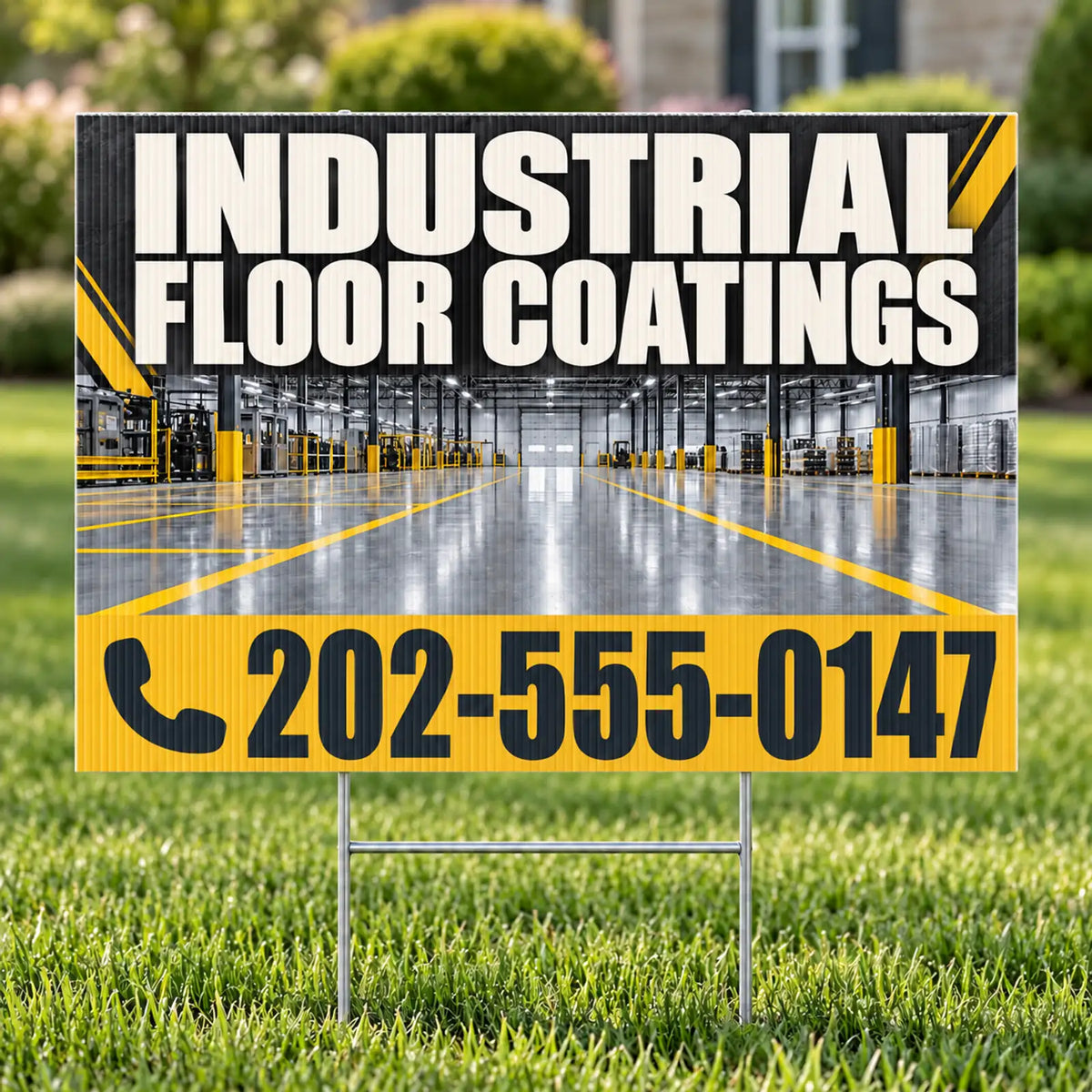 A yard sign on metal stakes displaying 'INDUSTRIAL FLOOR COATINGS' with a large phone number, set in a grassy outdoor area with a blurred industrial warehouse background.