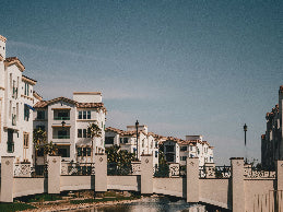 Modern apartment complex with a clear blue sky