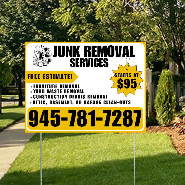 Yard sign for junk removal services with contact information on a grassy lawn.