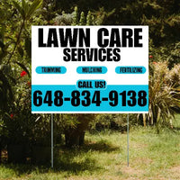 Lawn care services sign with contact information in a garden setting