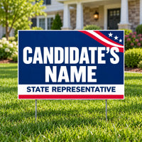A customizable political yard sign reading 'CANDIDATE'S NAME STATE REPRESENTATIVE' in white text on a blue background with a red and white striped star pattern, displayed on a green lawn in front of a house.