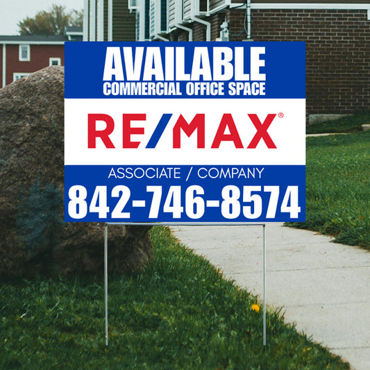 RE/MAX commercial office space for rent sign with contact number 842-746-8574 on a sidewalk lawn.