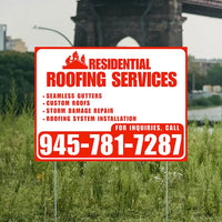 Residential roofing services sign with contact information in a grassy area.