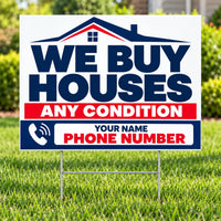 A yard sign on metal stakes in a grassy lawn that reads 'WE BUY HOUSES ANY CONDITION' with a blue house graphic and 'YOUR NAME PHONE NUMBER' at the bottom.